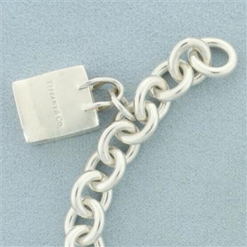 Tiffany and Co. Vintage Charm Bracelet with Taxi, Shopping Bag, Atlas Cube Charms