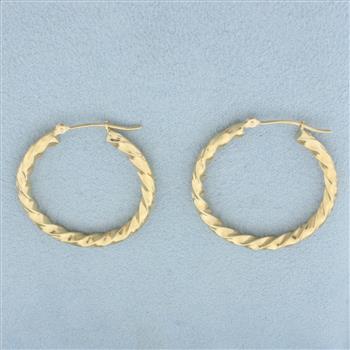 Twisting Design Hoop Earrings in 14k Yellow Gold