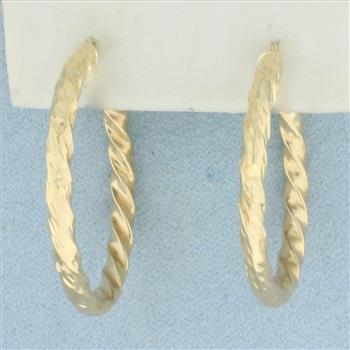Twisting Design Hoop Earrings in 14k Yellow Gold