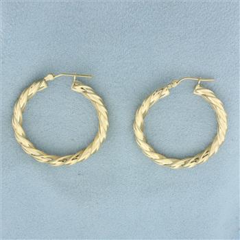 Twisting Hoop Earrings in 14k Yellow Gold