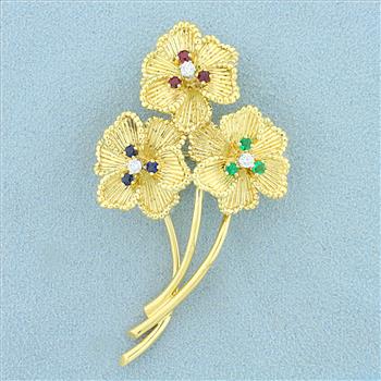 Vintage Dankner Emerald, Sapphire, Ruby, and Diamond Flower Pin in 18K Yellow Gold