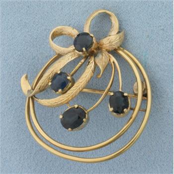 Vintage Sapphire Bow Design Brooch in 14K Yellow Gold
