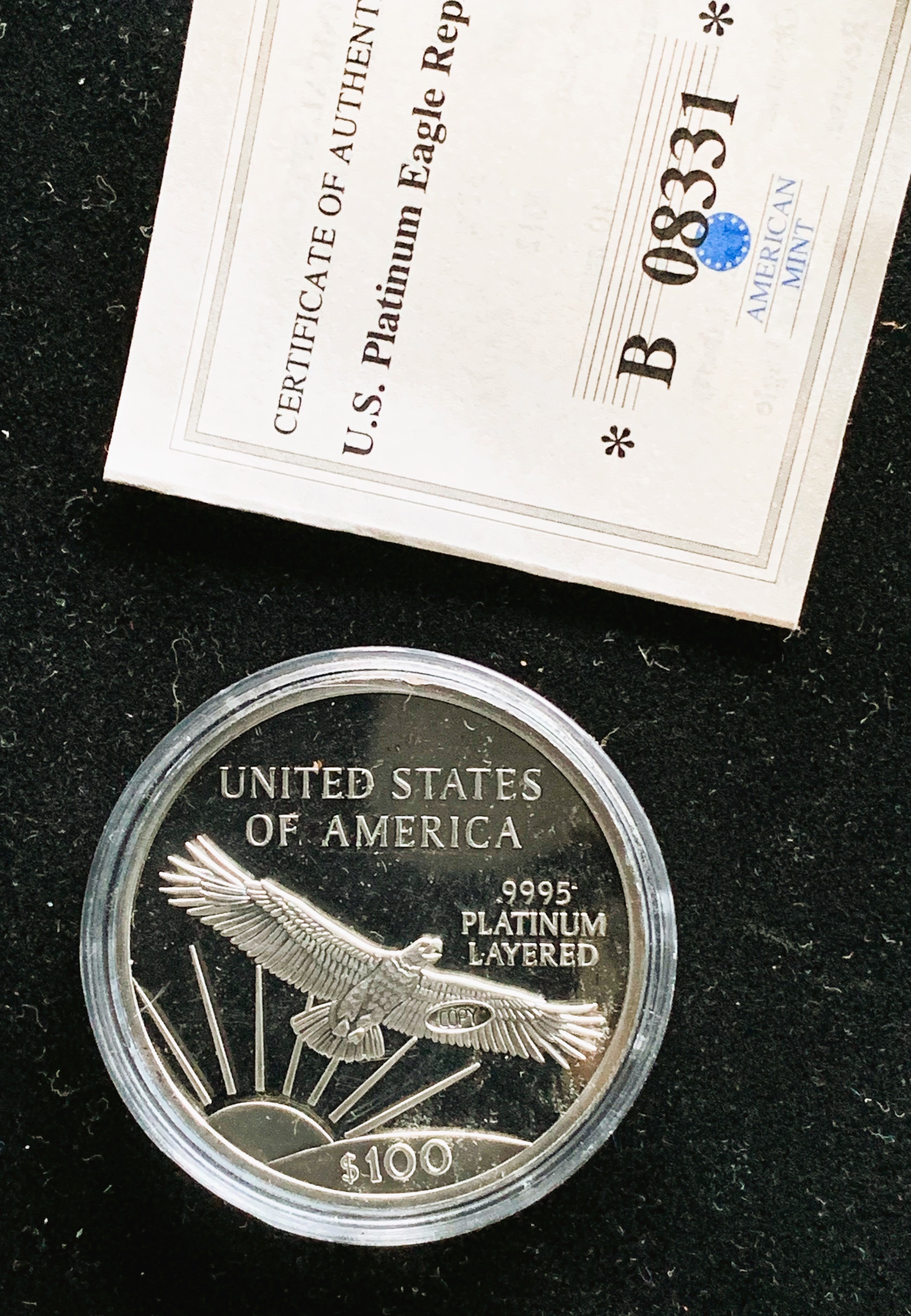 1997 100 EAGLE LADY LIBERTY PLATINUM REPLICA COIN, PROOF UNCIRCULATED