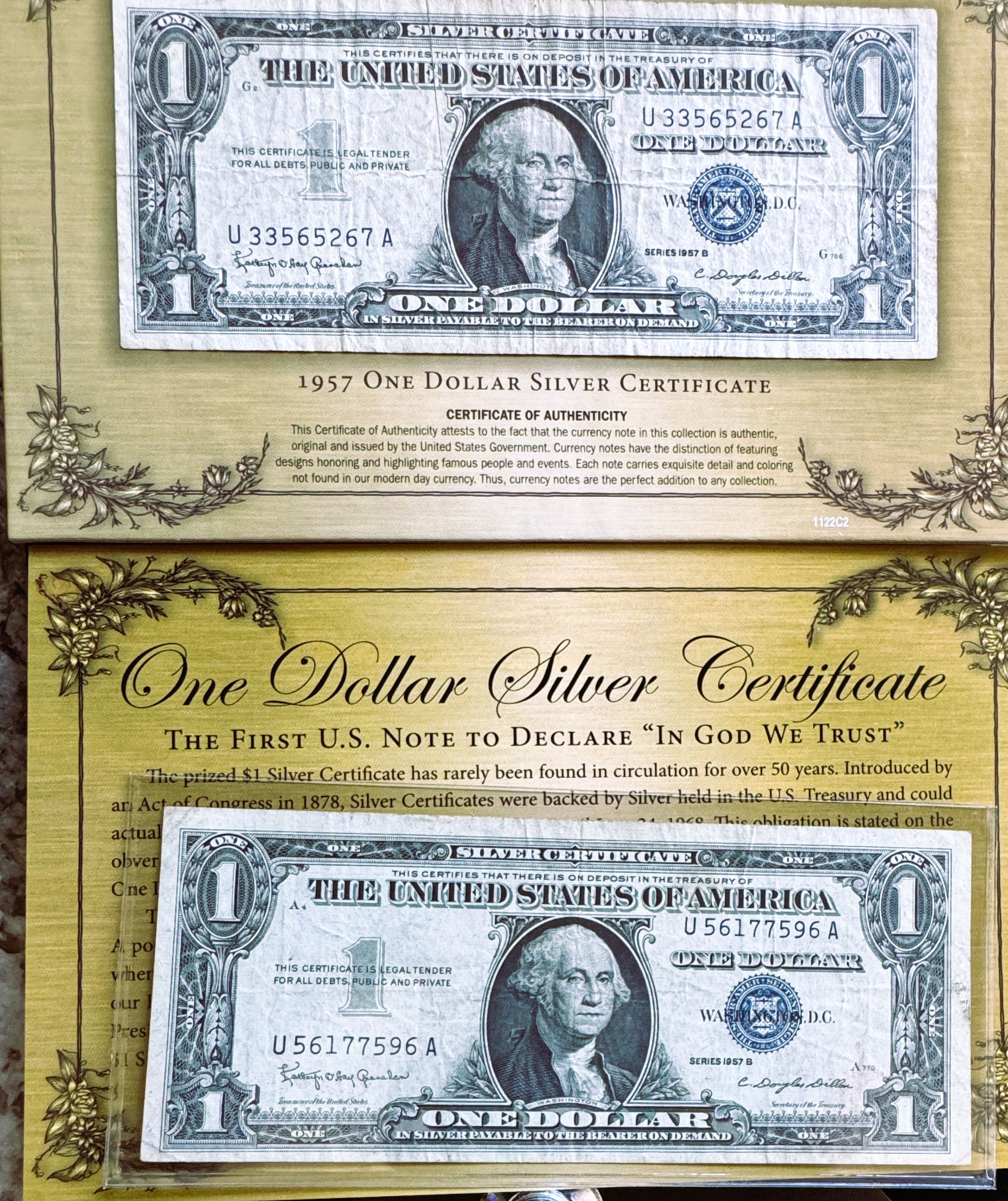 1957 B SERIES (two) $1 DOLLAR SILVER CERTIFICATES, FIRST US NOTE TO DECLARE "IN GOD WE TRUST", IN NICE DISPLAY FOLDER