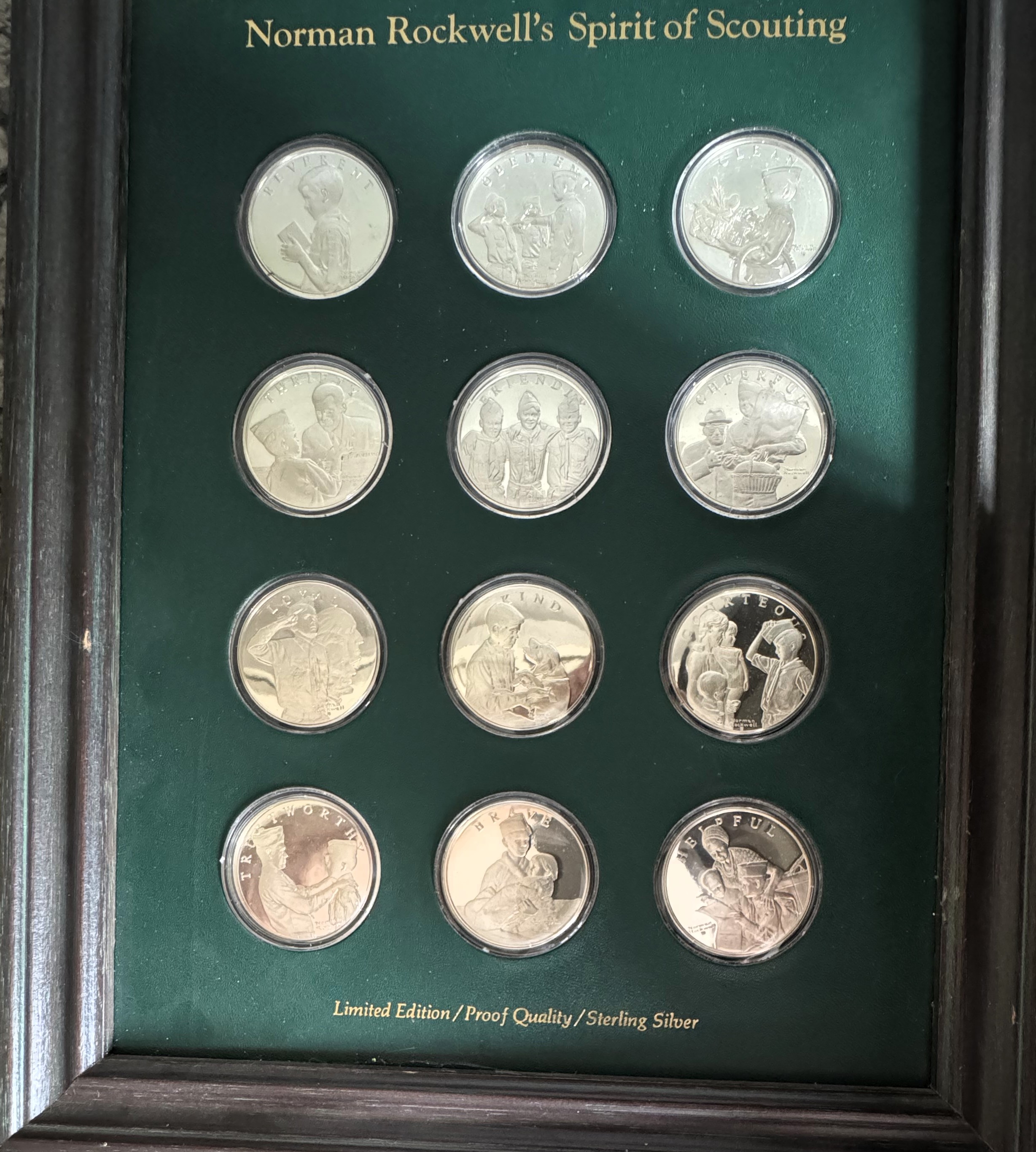 NORMAN ROCKWELL'S SPIRIT OF SCOUTING 12 COINS PROOF QUALITY STERLING SILVER, LIMITED EDITION SET IN ORIG CAPSULES & QUALITY DISPLAY FRAME