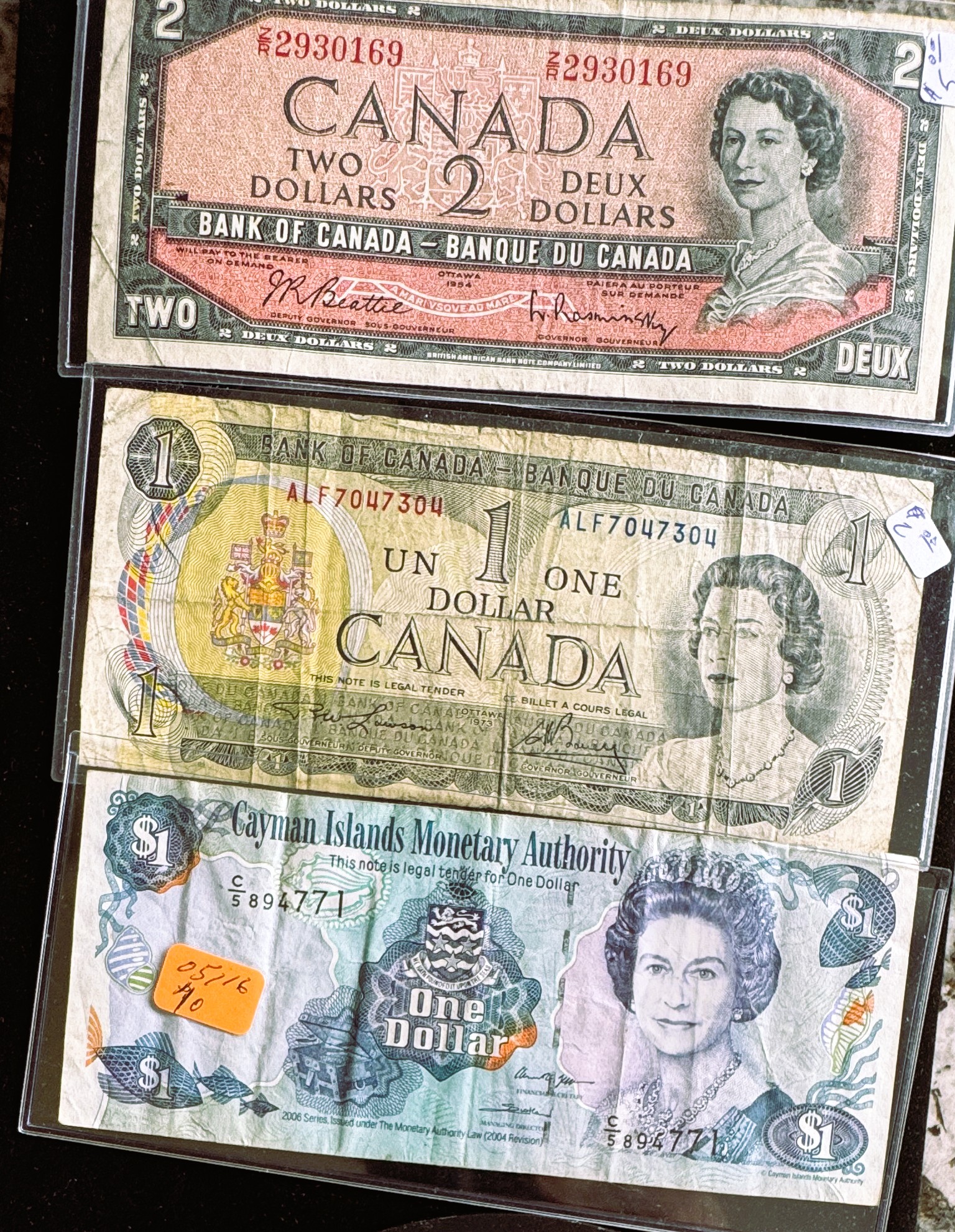 2006 CAYMAN ISLANDS $1, 1954 $2 & 1973 $1 CANADIAN IN SLEVES
