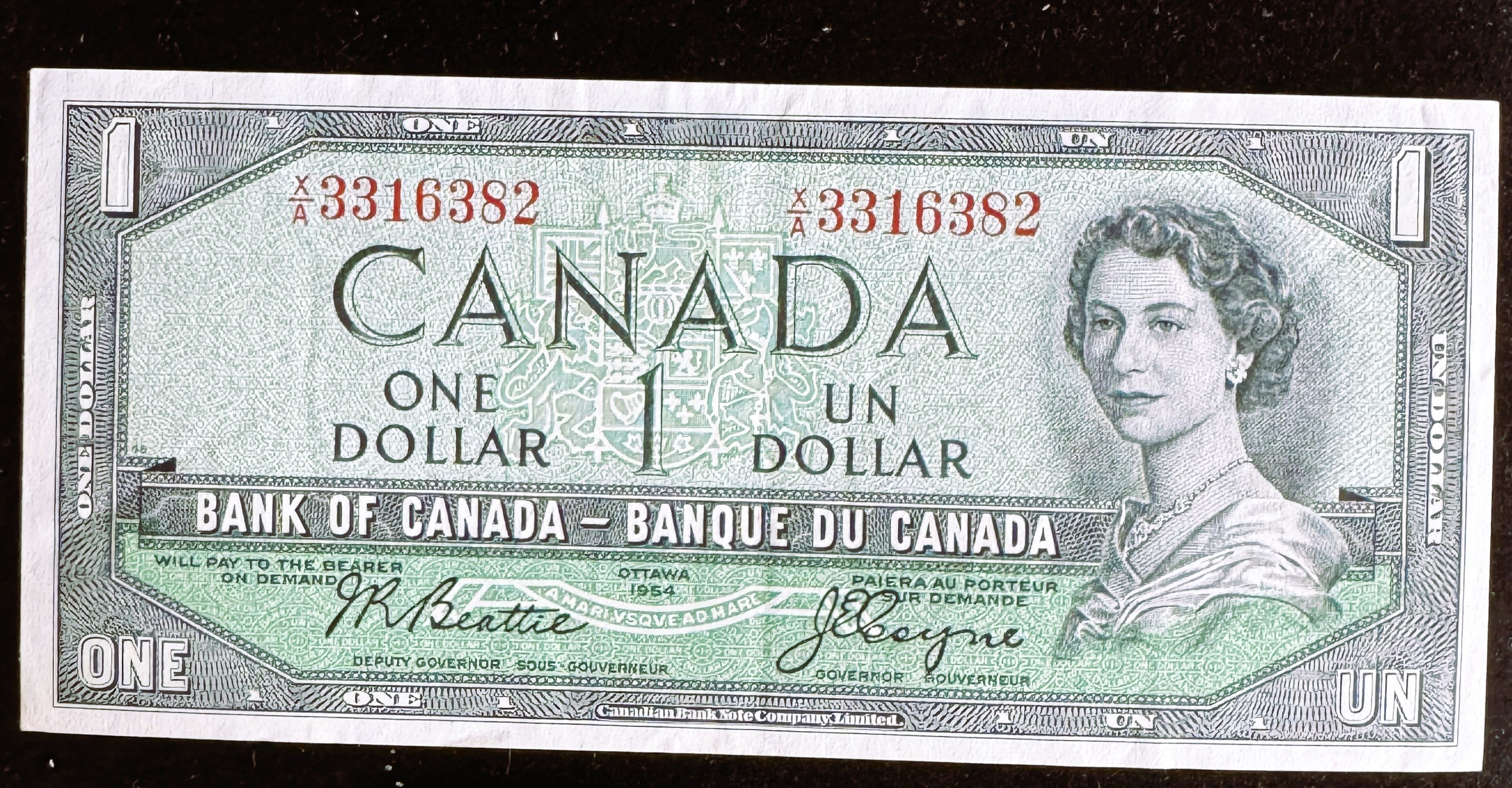1954 SERIES OTTAWA CANADA $1 DOLLAR DEVILS FACE UNCIRCULATED CURRENCY CRISP IN A SLEVE
