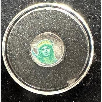 PLATINUM, U.S. 1999 $10 DOLLAR 1/10oz FINE .9995 PLATINUM COLORIZED COIN, UNBLEMISHED GEM  IN A CAPSULE, MY PHOTO NO JUSTICE