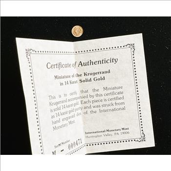 GOLD, MINATURE 14K GOLD 1980 SOUTH AFRICA KRUGERRAND COIN, STRUCK FROM HAND ENGRAVED DIES OF THEINT MONETARY MINT, COA