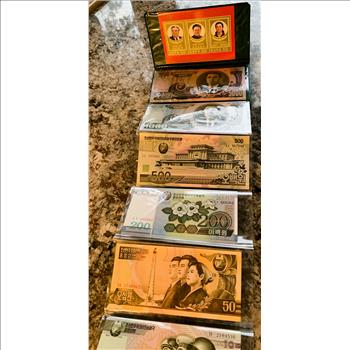 NORTH KOREAN UNCIRCULATED CRISP NOTES & COIN, STAMPS, MONEY PKG, IN COLLECTABLE FOLDER, REALLY NICE, 16 ITEMS & NK HOLDER