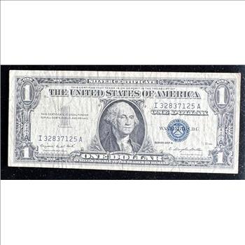 1957 A SERIES $1 DOLLAR SILVER CERTIFICATE IN A SLEVE