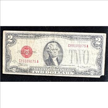1928 D SERIES $2 DOLLAR UNITED STATES NOTE, RED SEAL, RED NUMBERS IN A SLEVE