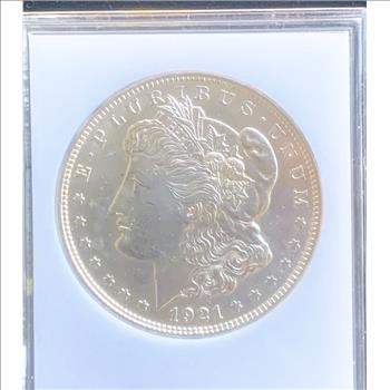 1921 MORGAN UNCIRCULATED TREASURY HOARD SILVER DOLLAR IN REALLY NICE LUSTER CONDITION , IN THE SLAB