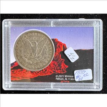 1889 MORGAN SILVER DOLLAR COIN IN A CASE