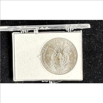 1986 .999 1oz FINE AMERICAN SILVER EAGLE $1 DOLLAR, (FIRST YEAR) BU COIN IN A CASE