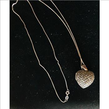 LADIES VINTAGE STERLING SILVER OPENING HEART LOCKET AND 24