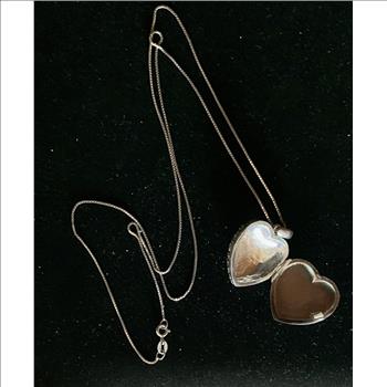 LADIES VINTAGE STERLING SILVER OPENING HEART LOCKET AND 24