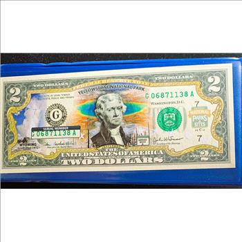 $2 DOLLAR OFFICIAL FEDERAL RESERVE BANK NOTE, YELLOWSTONE NAT PARK COMMEMORATIVE, BU IN ORIG FOLDER