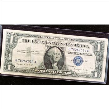 1957 A SERIES $1 DOLLAR SILVER CERTIFICATE NOTE, BLUE SEAL CRISP IN SLEVE