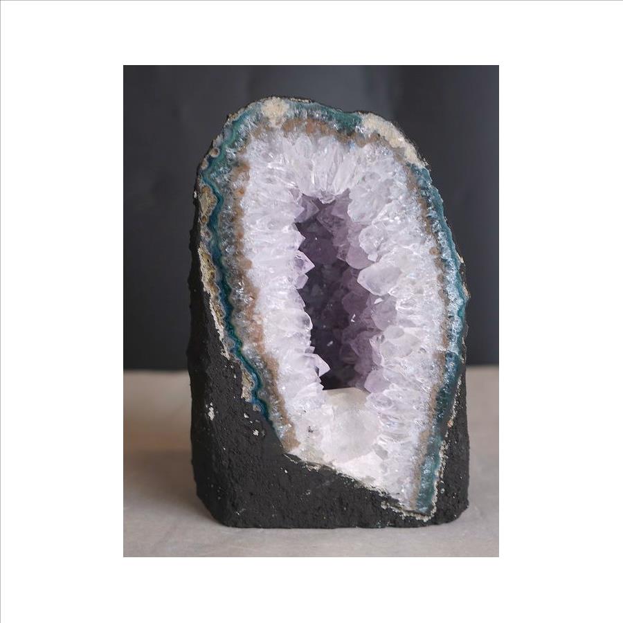 Natural Amethyst Geode Cathedral Style - Item is 6 inches tall - 5 inches wide - 4 inches deep - 5 lbs - Retail Value $249.99