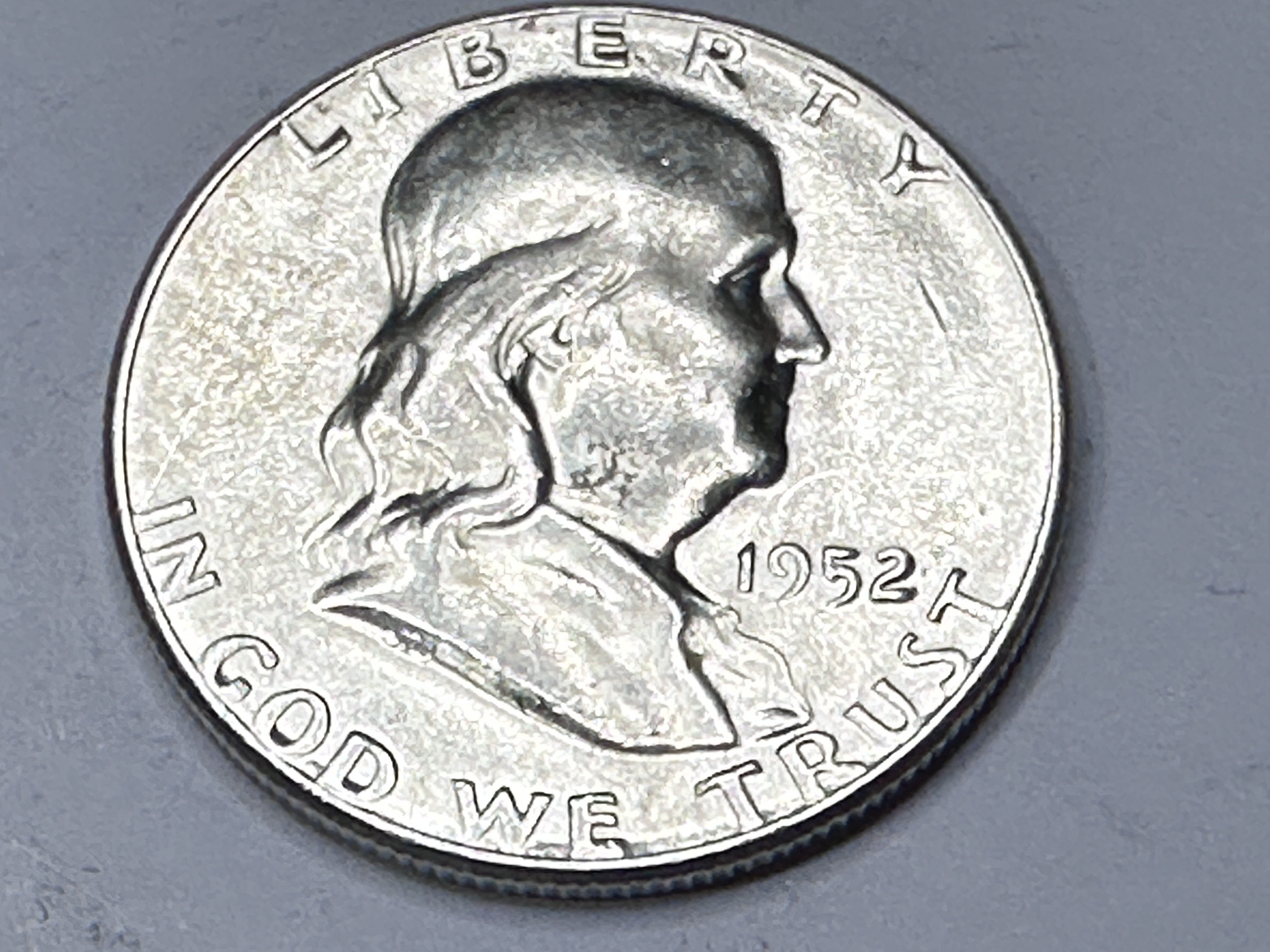 1952 AU Grade Franklin Half Dollar