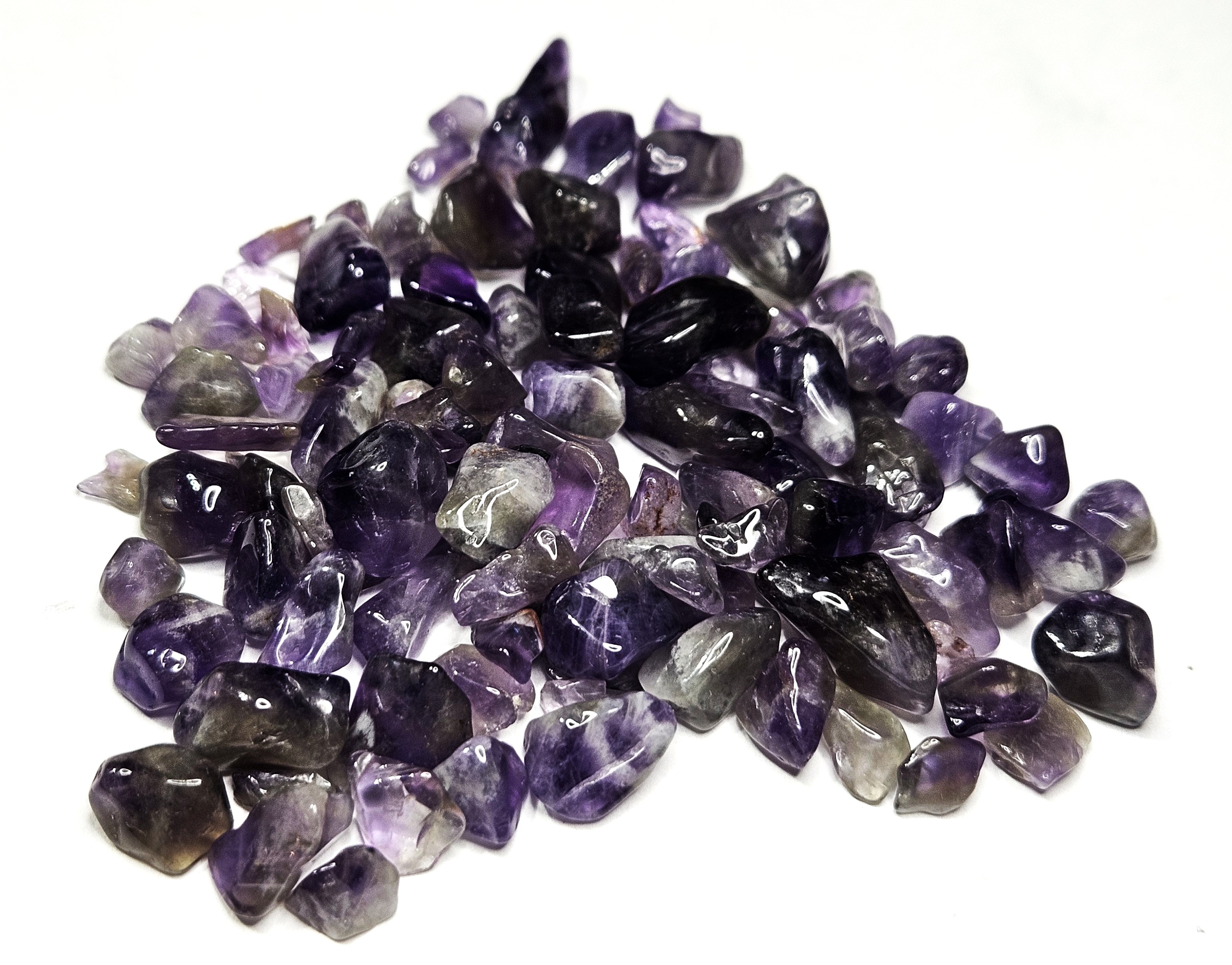 27.12 grams - 135.5 tcw. Natural Amethyst Tumbled Chips