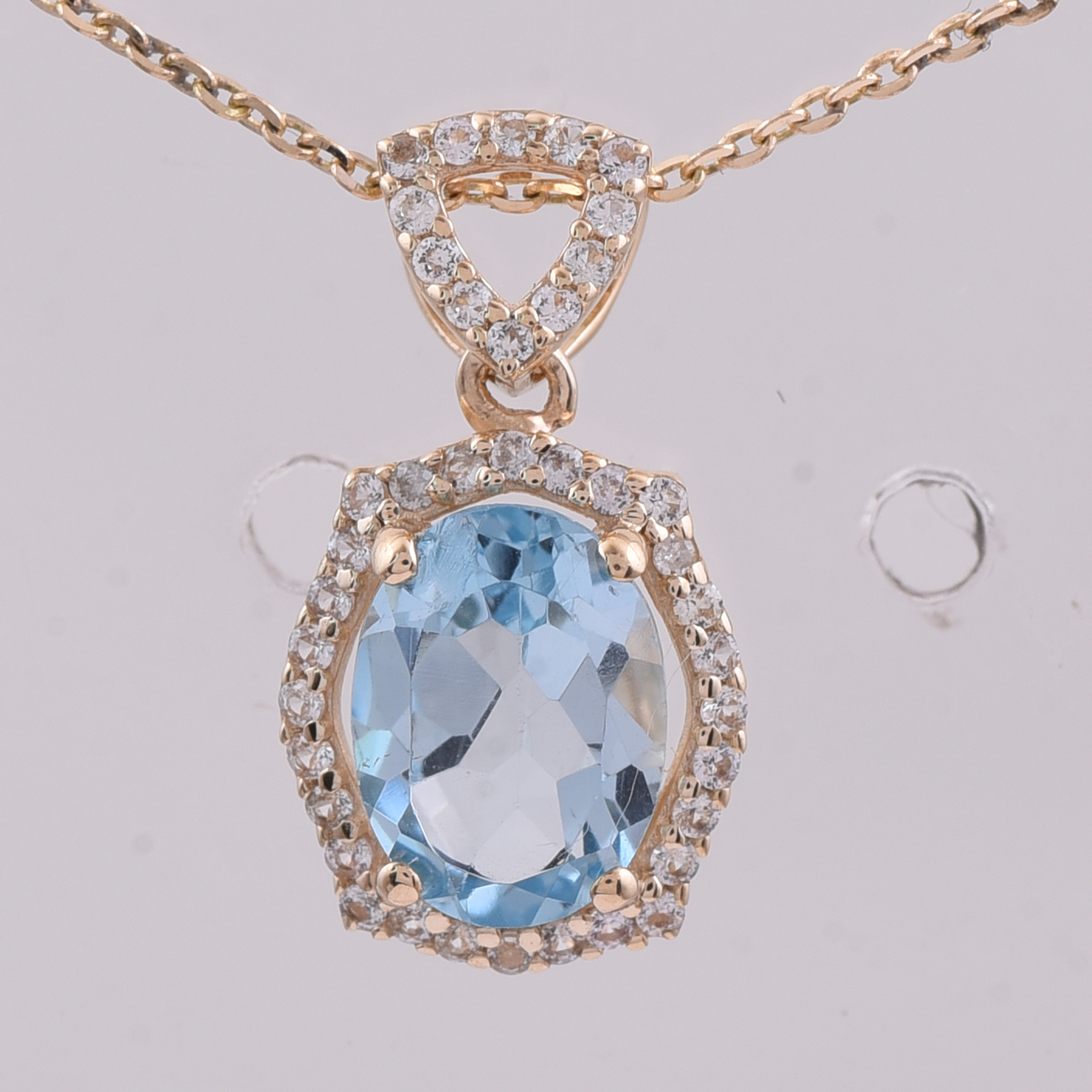 9K Gold 1.55 Ct Oval Blue Topaz Pendant
