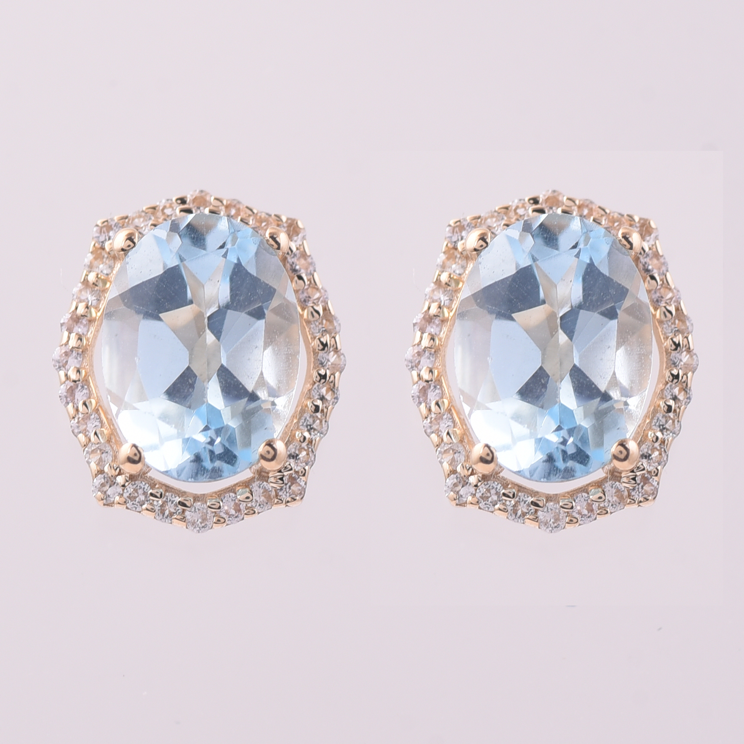 9K Gold 3.14 Ct Oval Blue Topaz Earrings