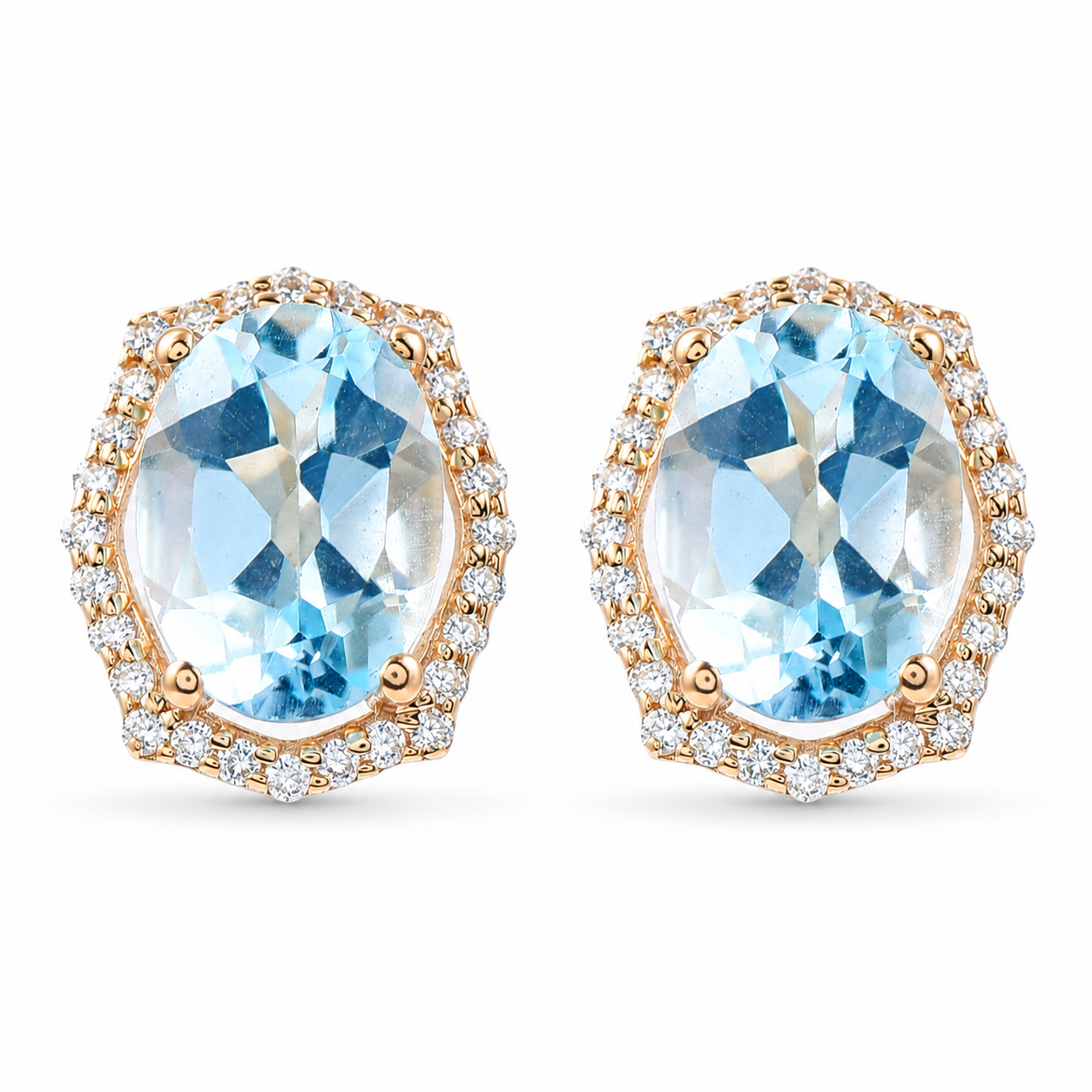 9K Gold 3.14 Ct Oval Blue Topaz Earrings