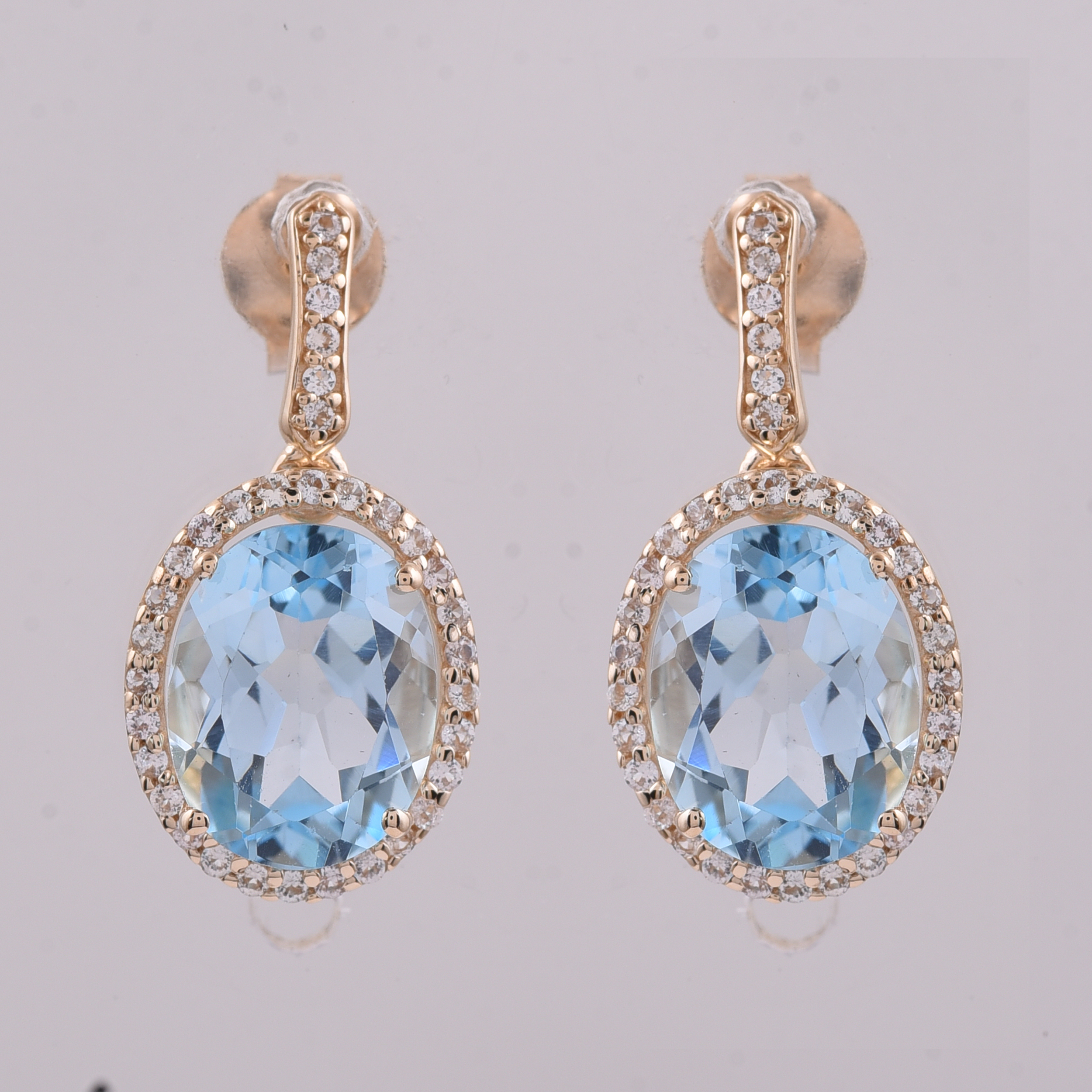 9K Gold 4.75 Ct Oval Blue Topaz Earrings