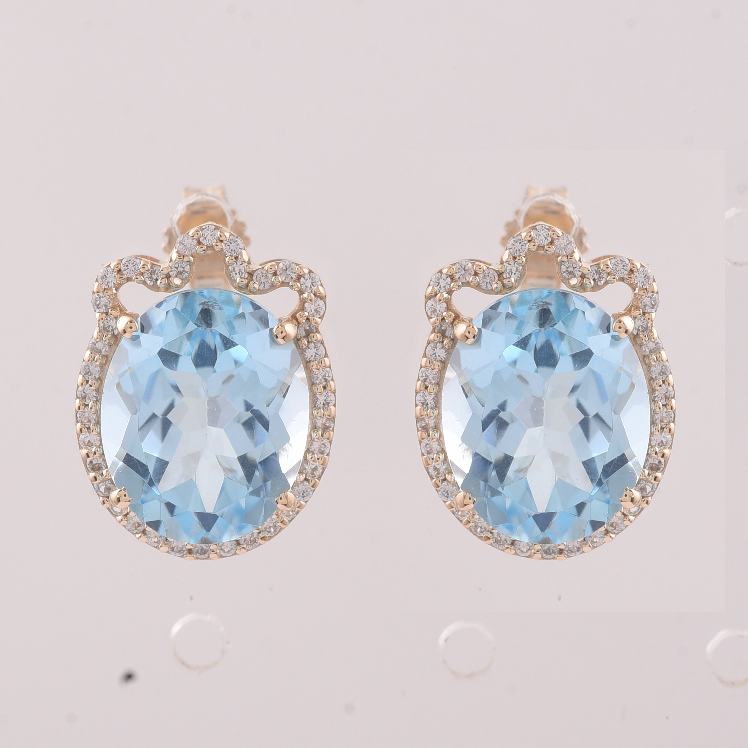 9K Gold 9.24 Ct Oval Blue Topaz Earrings