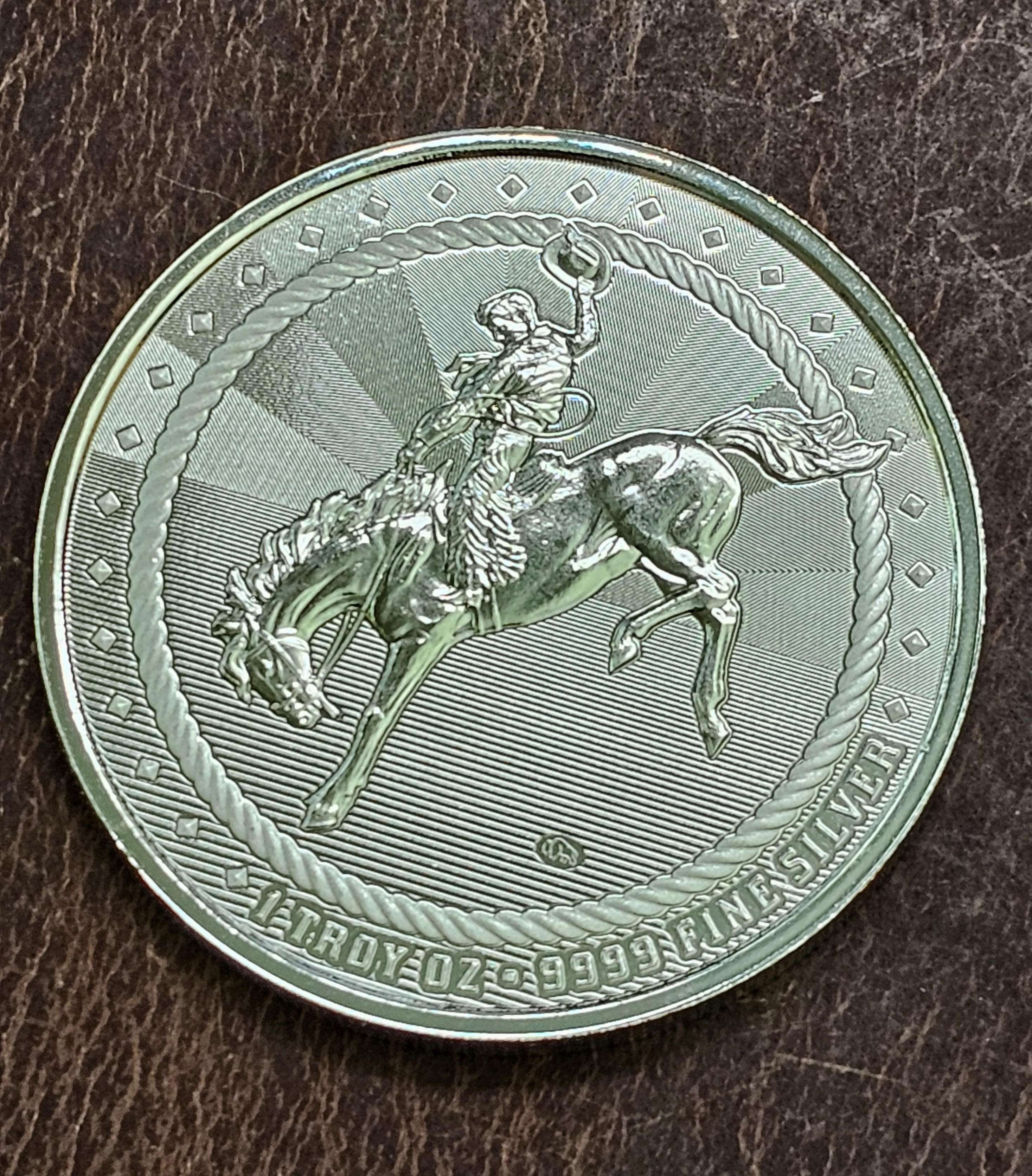 1 oz .999 Fine Silver Cowboy w/Buffalo Privy Round